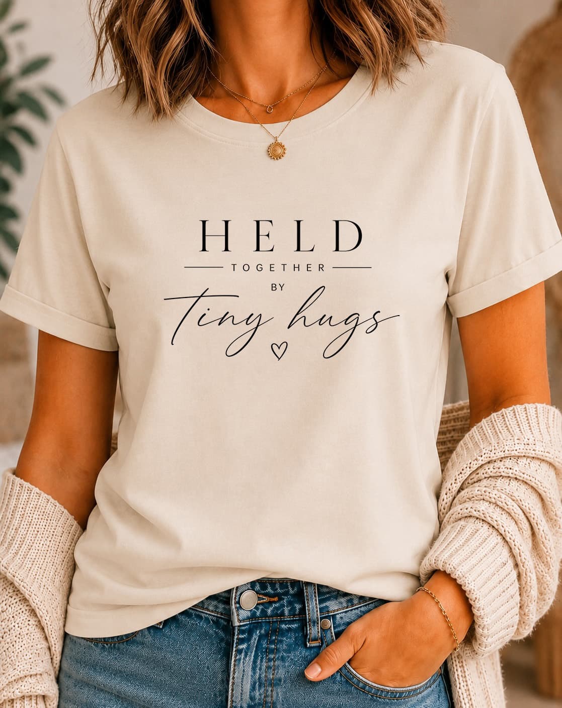 Held Together by Tiny Hugs women's slogan t-shirt by ObjectHours